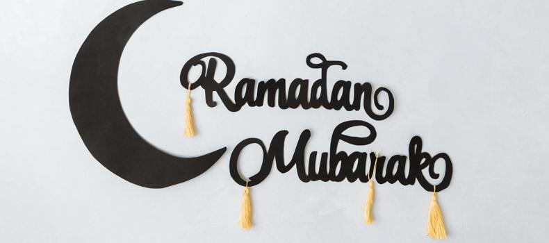 Muslims giving charity and food during Ramadan nights